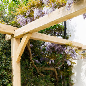 The new pergola is made from thick chunky oak