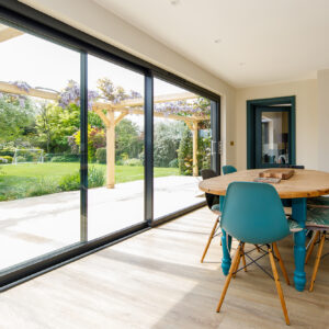 Large sliding doors now open the kitchen/dining space onto the garden