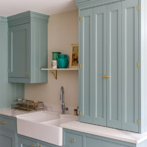 Folding concertina doors disguise the barista cupboard