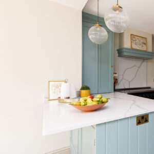 The white quartz worktop finishes off this now high-end kitchen perfectly