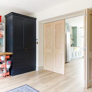 Concertina doors lead from the kitchen to the playroom and additional reception room