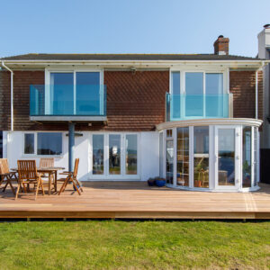 The hardwood decking looks great across the back of the house