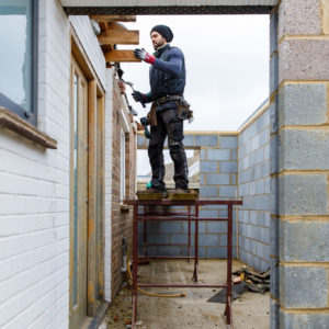 The ceiling height will be flush across the new and old kitchen