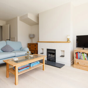 The front room has a new thick wood laminate flooring.