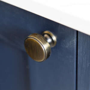 Antique brass knobs on the cupboard doors