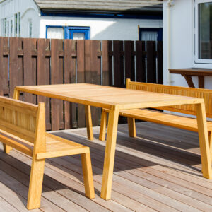 Our carpenter Elliot has built a family dining table with two matching benches