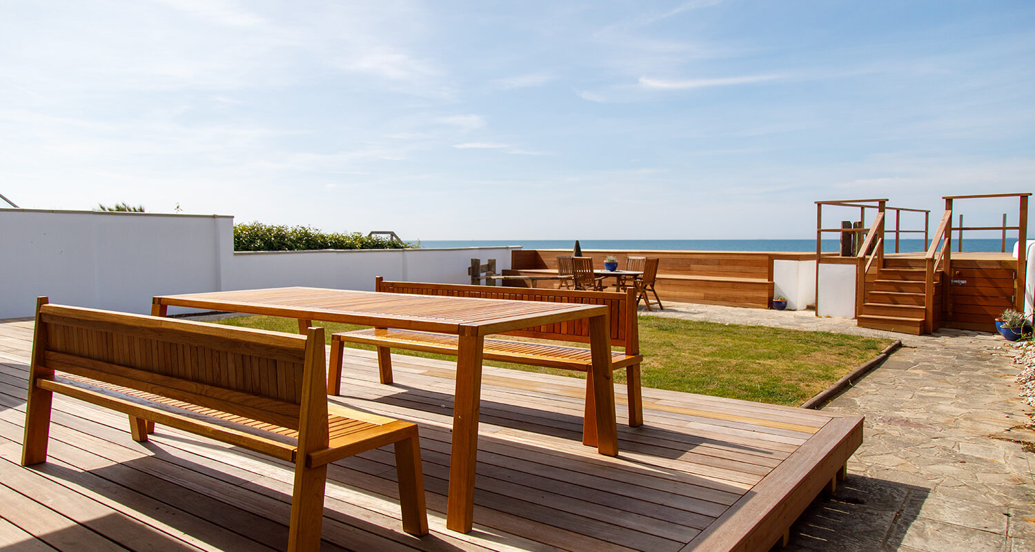 All of the outdoor furniture and structures have been made from teak. Super long lasting, very tough and hard wearing.