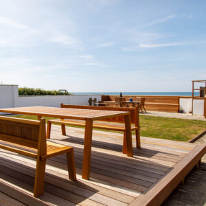 All of the outdoor furniture and structures have been made from teak. Super long lasting, very tough and hard wearing.