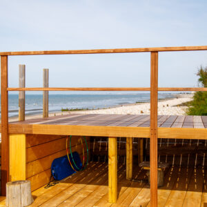 Under the raised platform is a large storage space for equipment and toys