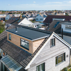 The existing dormer joins seamlessly to the new dormer and new roofing felt across the entire new flat roof