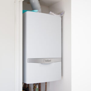 A replacement combi boiler is housed in the large cupboard and has easy access to the flue above
