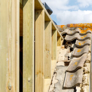 The dormer window is stepped back slight from the front elevation which is more aesthetically pleasing than being flush