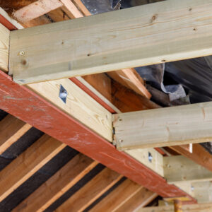 A view of the overhead beam with the dormer roof joists attached