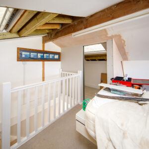 We are borrowed some space over the stairs to create a bathroom to sit snug in the corner of the room