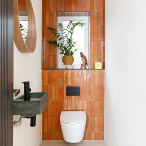 The wall hung toilet and small basin are great space savers in small rooms