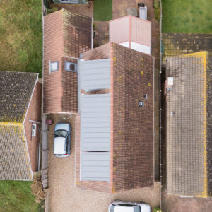 The dormers are split into 3 blocks to comply with planning regulations