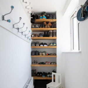 A clever design for this narrow boot room