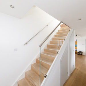 The stair previously had no balustrade so we have fitted a toughened glass one which allows maximum light into the hallway
