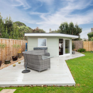 We extended the decking area for a long patio dining area