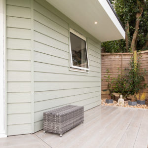 The large over hang from the roof is an attractive feature that creates some shade and shelter